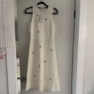 Elegant White Midi Dress with Floral Details